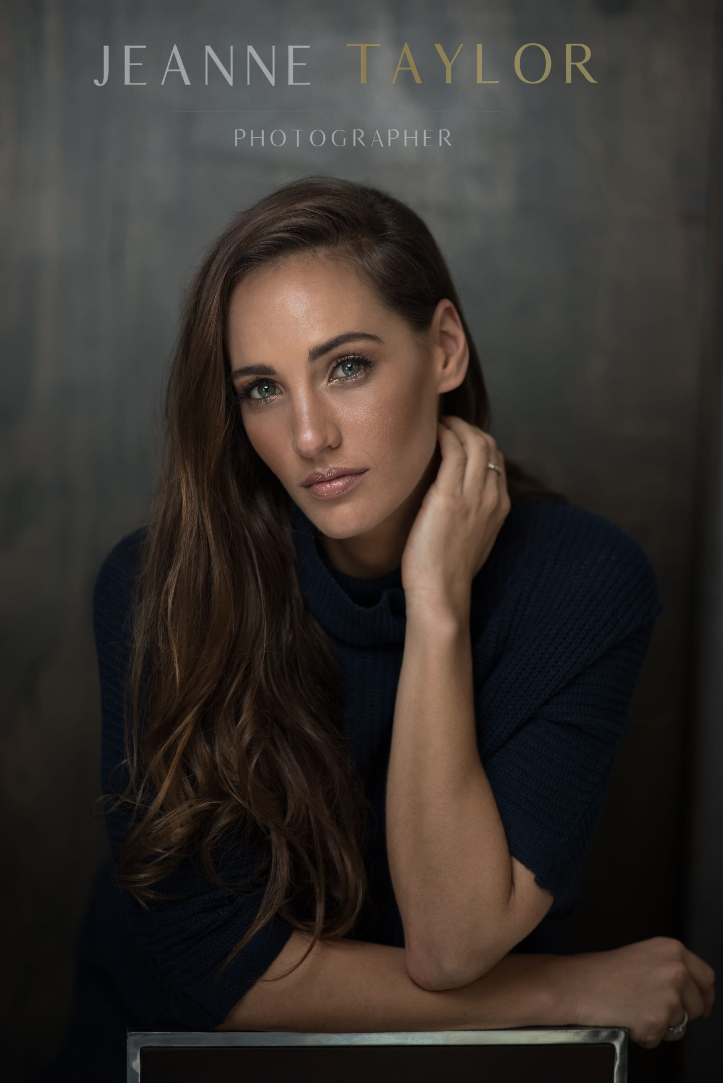 Elegant portrait of a woman in a navy sweater — portrait photography in Cape Town by Jeanne Taylor